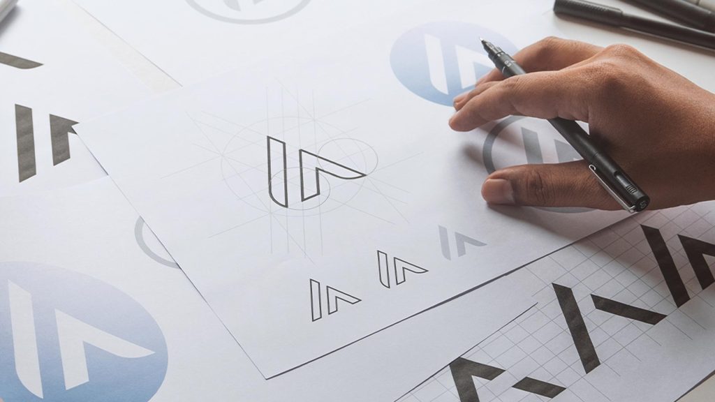 Logo concepts on paper.