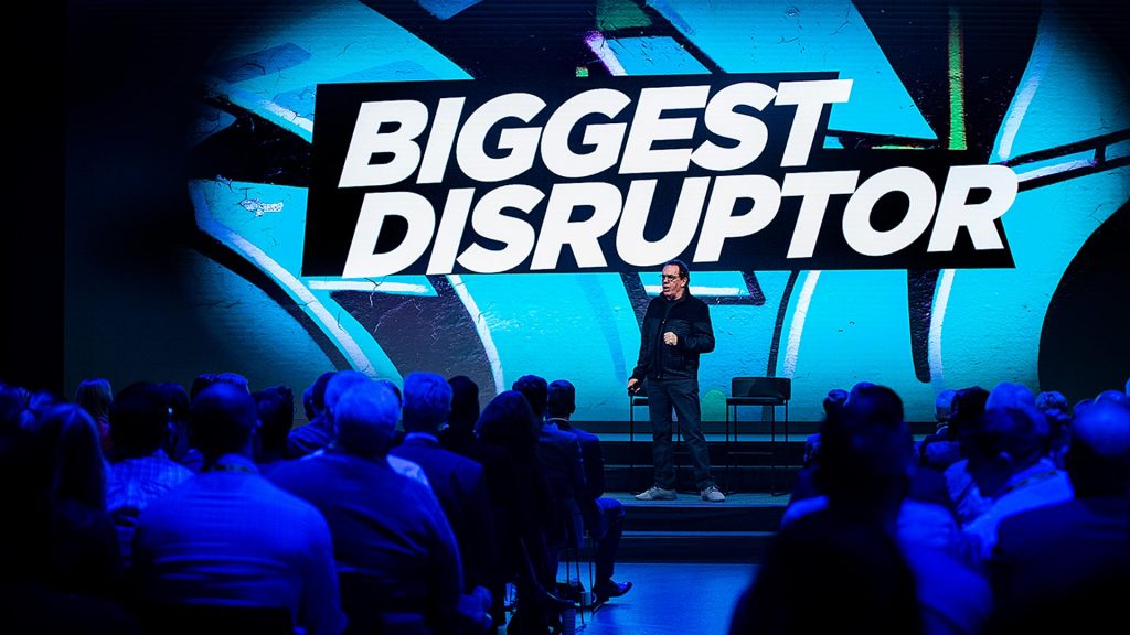 Biggest disruptor sign on stage.