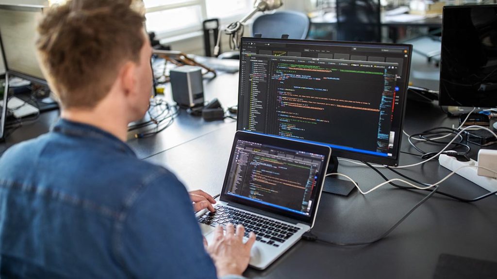 Person coding.